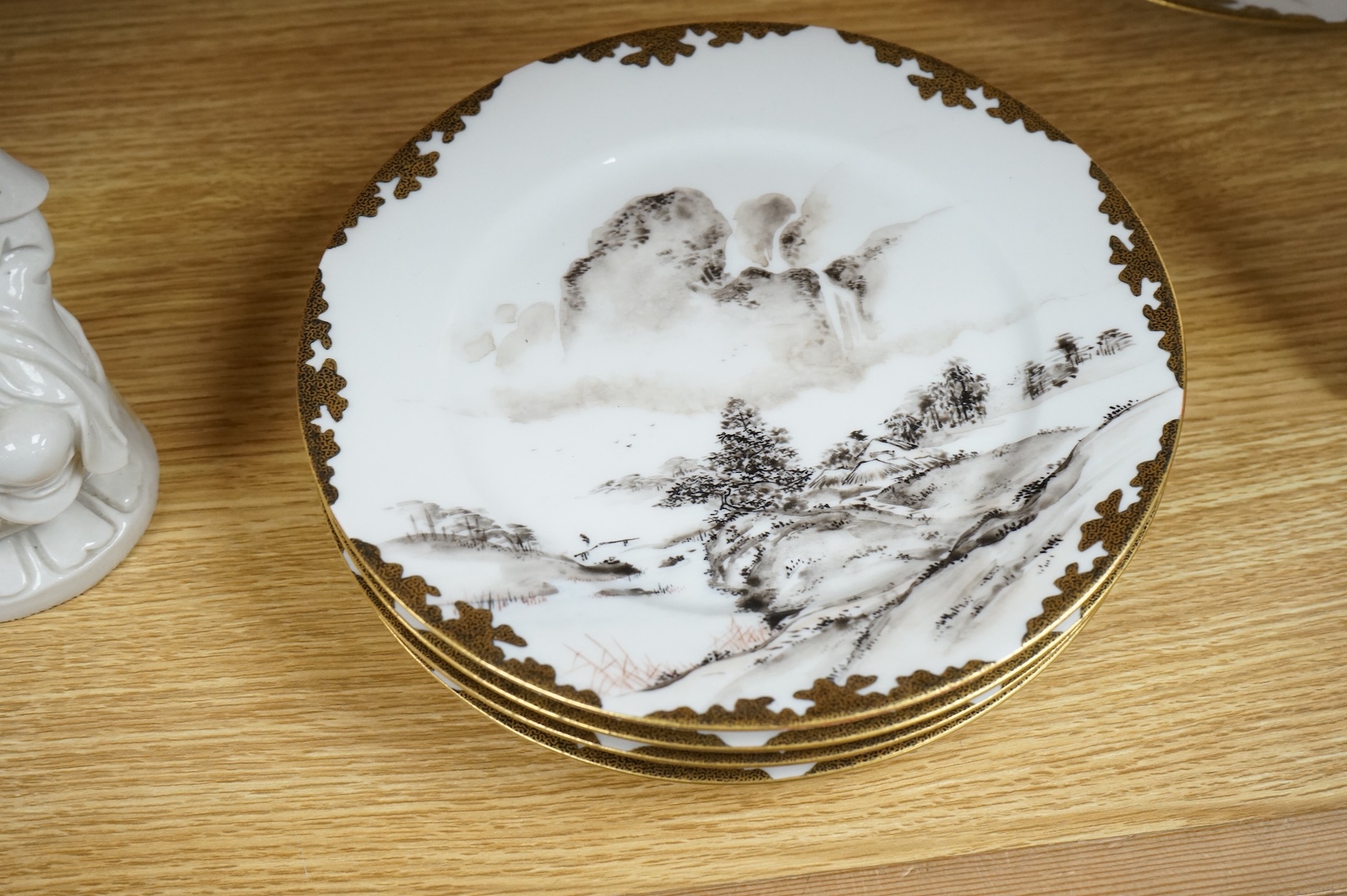 Four Japanese gilt decorated plates, Meiji period, 21cm diameter